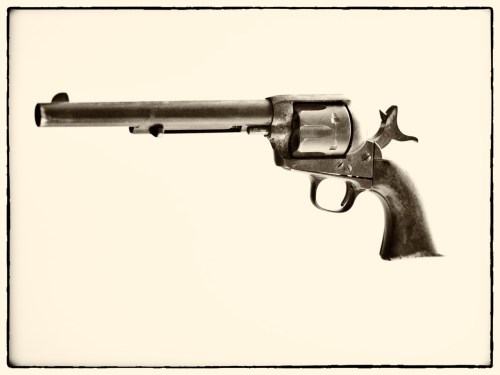 Jasper Parrett's .44 caliber gun, manufactured by Colt in 1875. It weighs 2 lbs., 14 oz.--too heavy to twirl on your finger, cowboy-style.